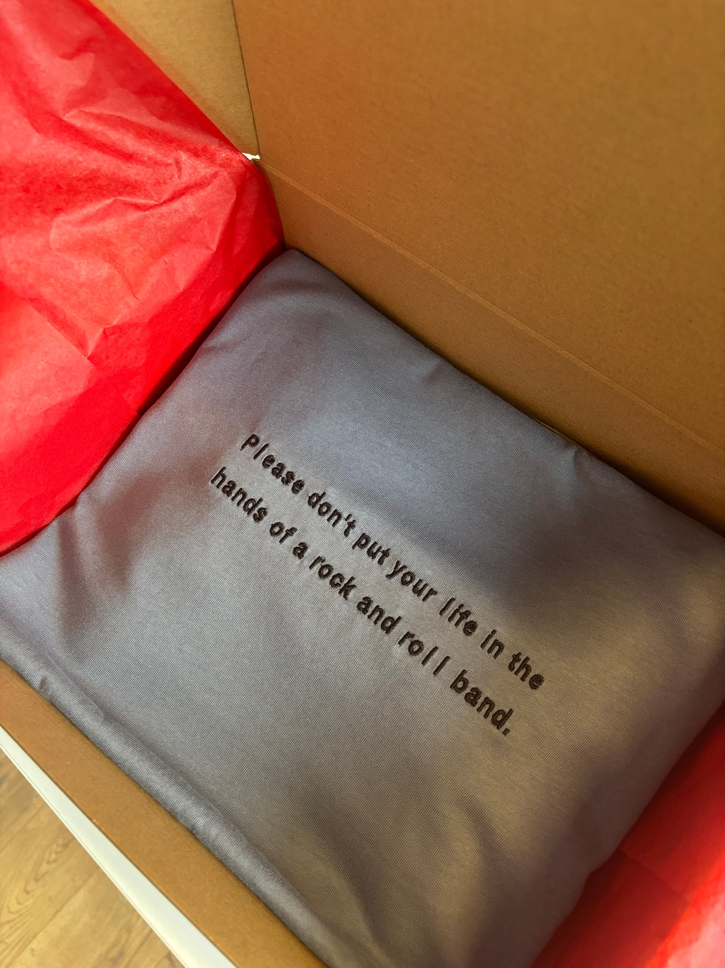 Oasis Lyric Embroidered T-Shirt – “Please don’t put your life…” | 100% Organic Cotton | Unisex | XS–5XL | Multiple Colors